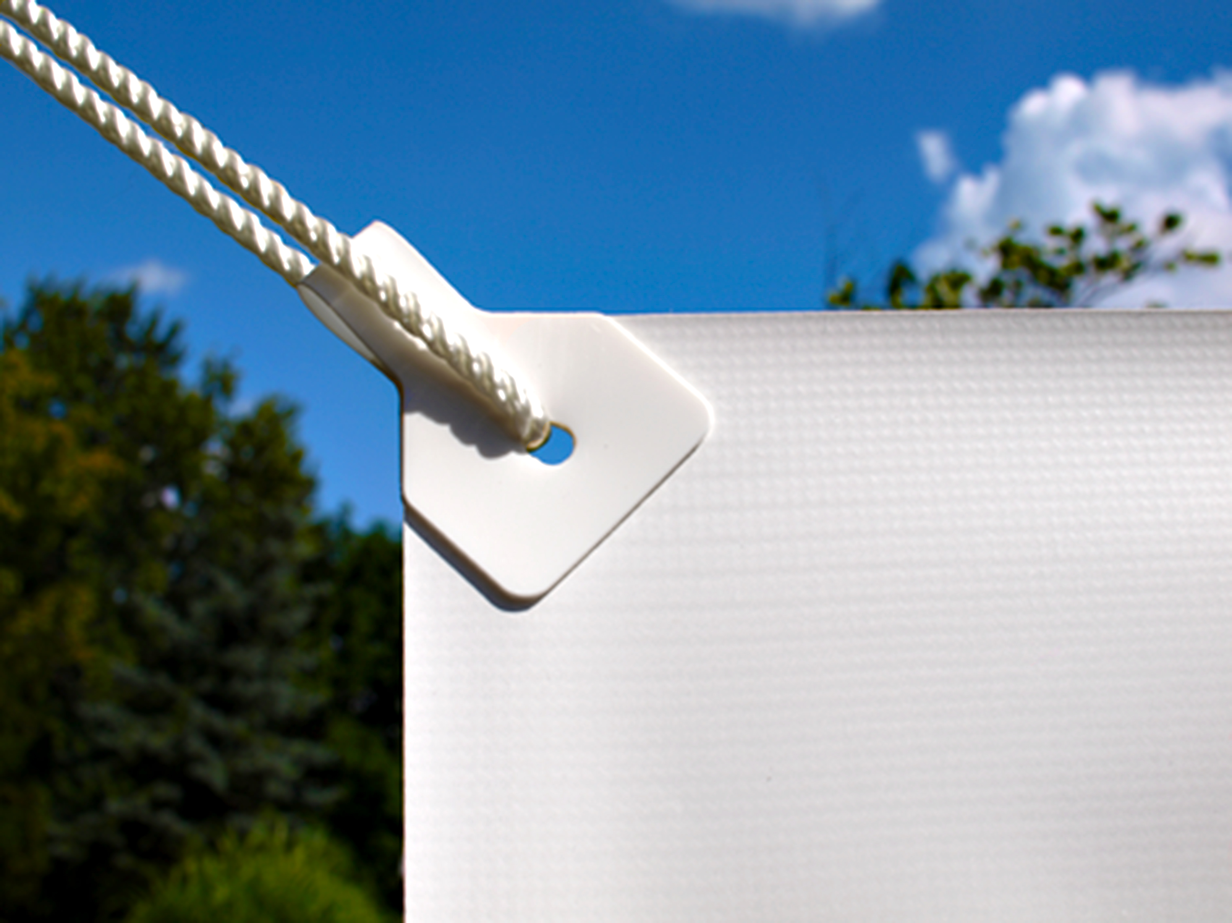 Yellotools BannerBone Classic installed on white banner outdoors