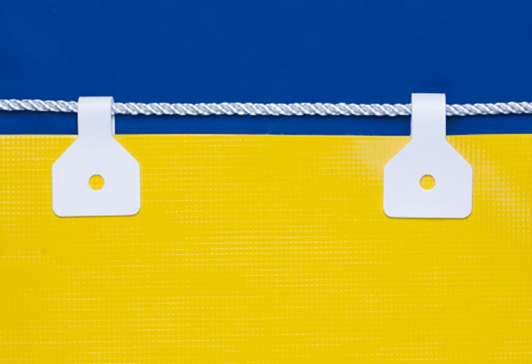 Yellotools BannerBone Classic installed 2x on yellow banner