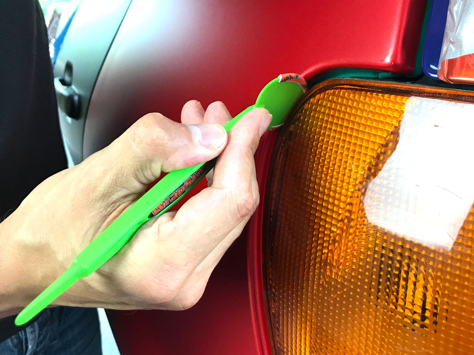 Yellotools WrapStick Betty Green application in car body gap